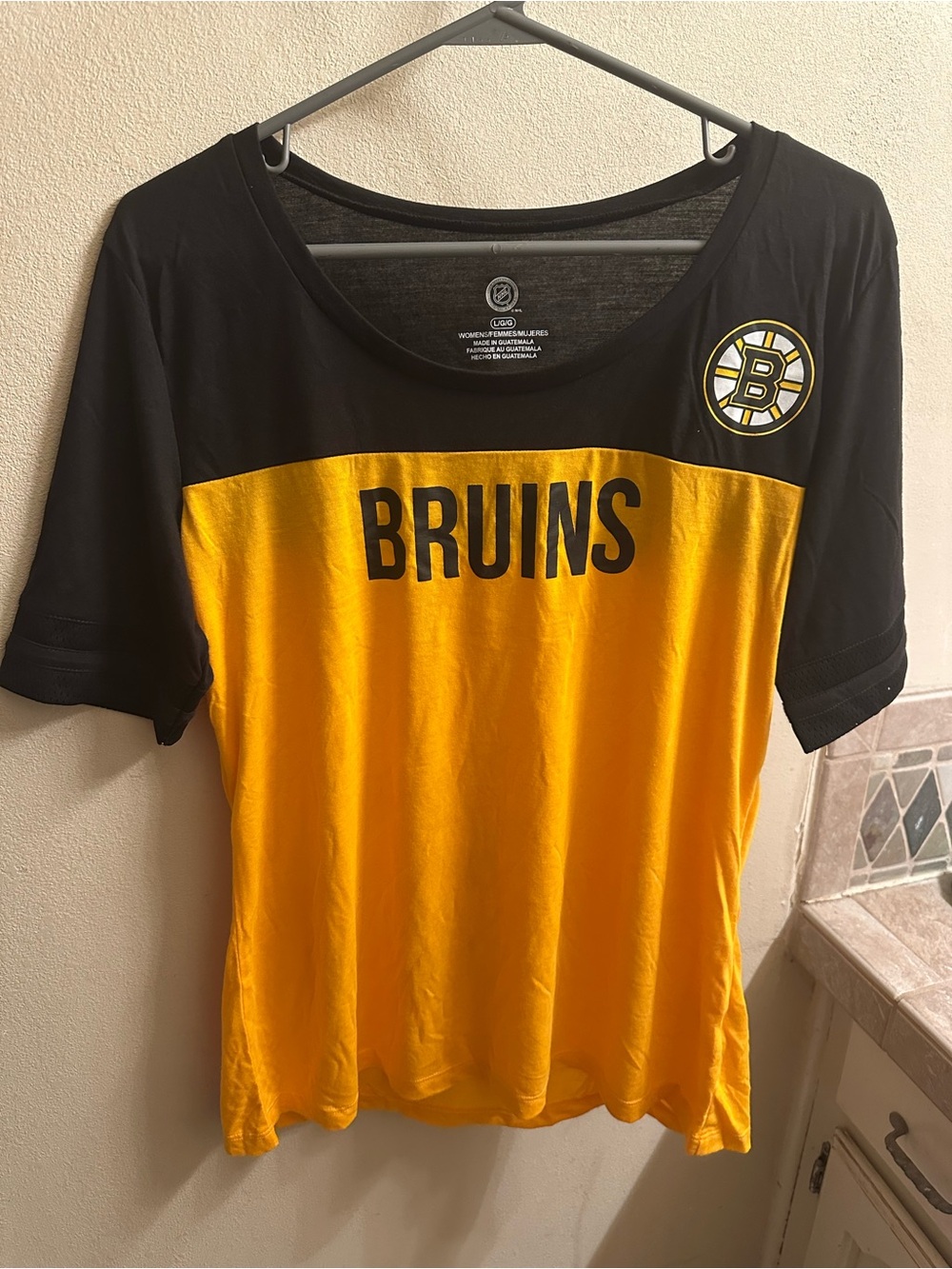 NHL Women's Black and Gold Team Tee